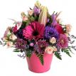 Sweet pink and purple flowers in ceramic